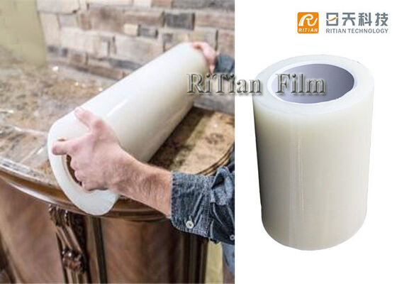 Un bon prix. Film protecteur PE de qualité industrielle avec adhésif à base de caoutchouc, résistance aux UV de six mois et retrait sans résidus pour la protection des surfaces en ligne